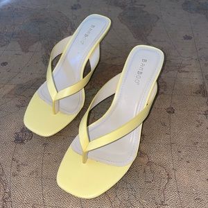 Yellow heeled sandals/mules